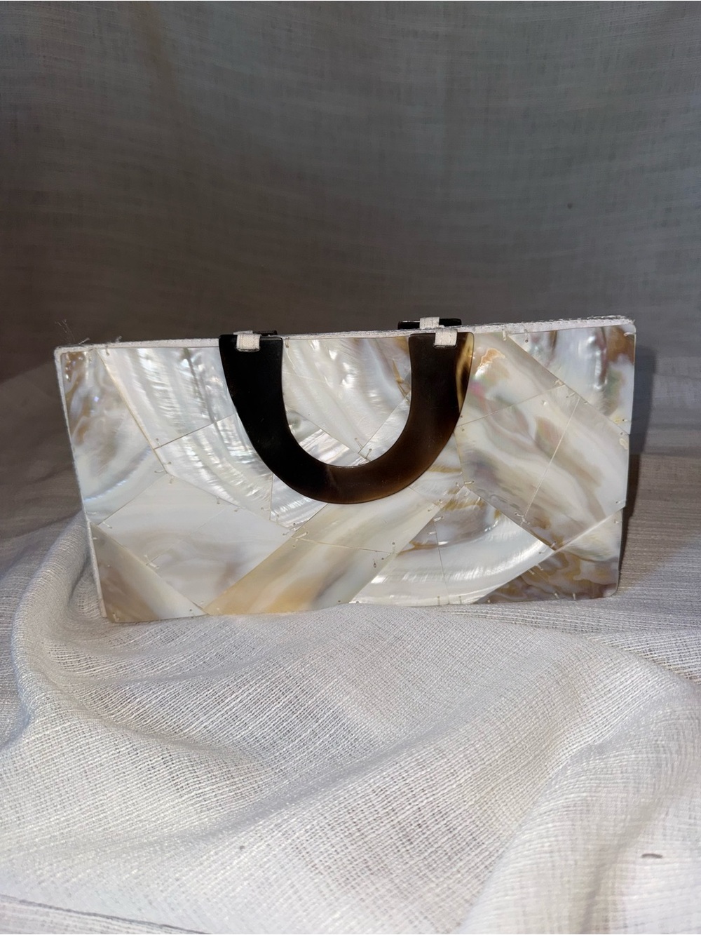 Shiraleah Iridescent Mother-of-Pearl Clutch with Dark Handle